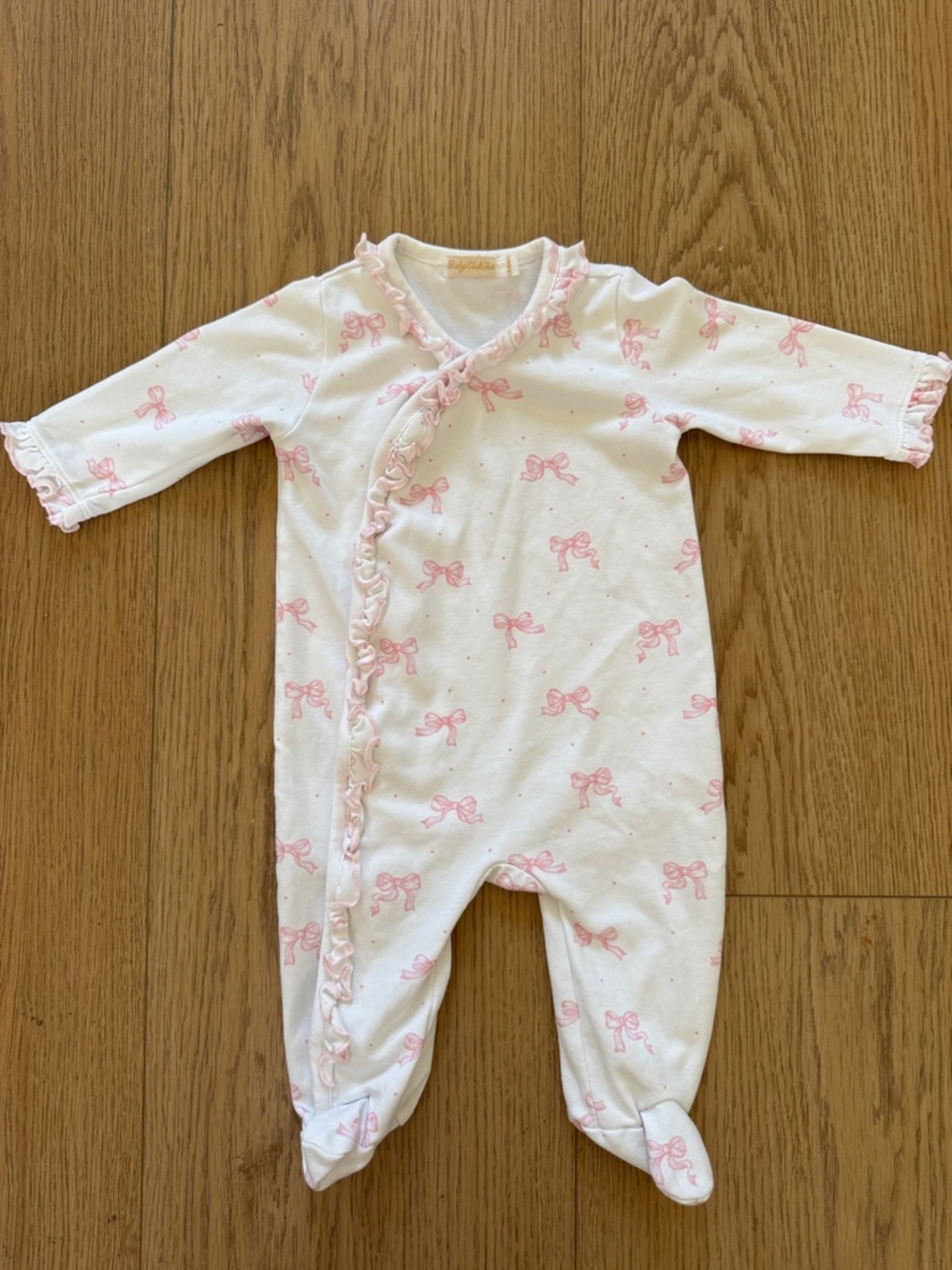 Baby Club Chic One-Piece Footed Sleeper in Pink Bow Print